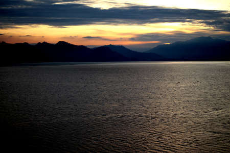 Gorgeous Lake And Sunshet behind