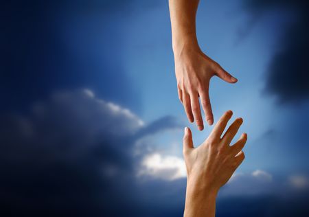 A Hand reaching Out to Someoneの写真素材