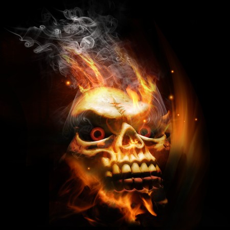 A burning skull with red eyes.の写真素材