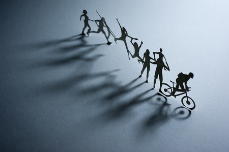 A Line of Paper People - Macro photographyの写真素材