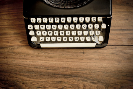 A Vintage Typewriter on a wooden table 