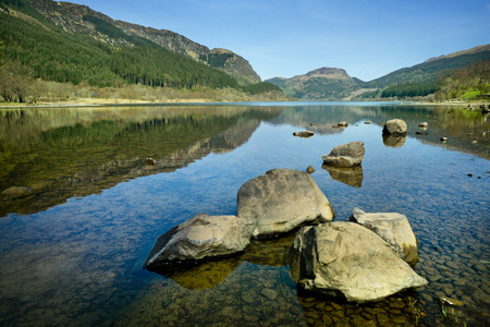 Lake Landscape, Scotland - Highlands with reflections on a clear day.の写真素材