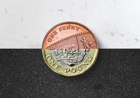 Pennies into Pounds. One half a penny and one half a pound, Money concept.