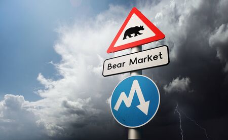 Financial Stock Market Downturn. A bear market global recession with warning markings on road signs. 3D illustration concept.の写真素材