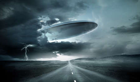 A large alien spaceship emerging from storm clouds on earth. 3D illustration.