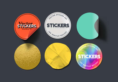 A set of blank round adhesive paper stickers in various states and colours. Isolated label collection vector illustration.のイラスト素材