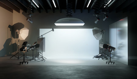 A large and professional photography studio room with lighting equipment. 3D illustration.の写真素材