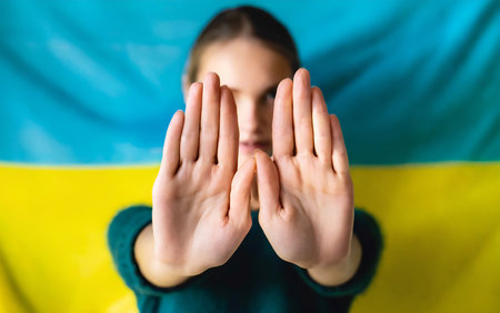 Stop war in Ukraine poster with flag. Support and protection Ukrainian people.の素材