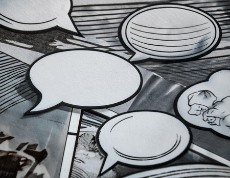 Close up image of a comic strip with speech bubbles, illustrating graphic storytelling, humor, and visual narratives.の素材