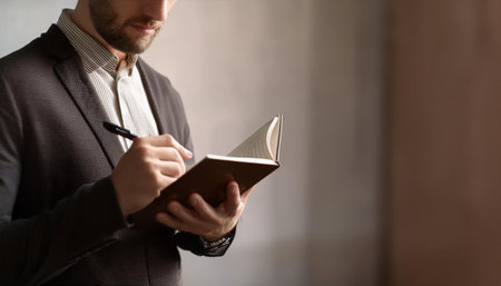 Close-up image of a person in a specific position on a map, symbolizing location, navigation, and strategy.の素材