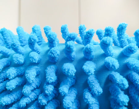 Closeup of a blue, textured microfiber cleaning cloth. Great for hygiene, cleaning, and abstract...