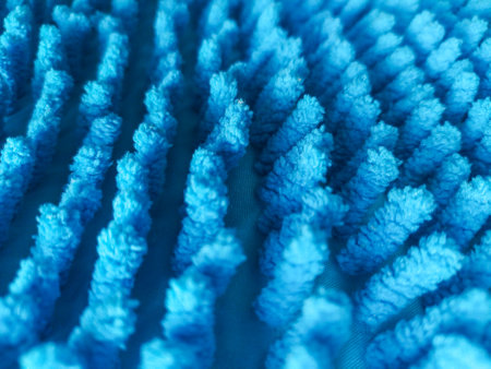 Abstract macro of a textured blue surface. Suggests cleanliness, hygiene, and softness. Perfect for...