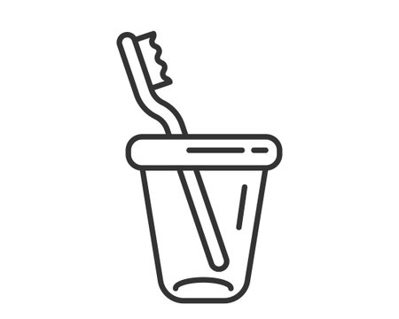 A minimalist line art illustration depicts a toothbrush in a glass. Symbolizes oral hygiene, health, and daily routines. Ideal for dental, wellness, or lifestyle content.のイラスト素材