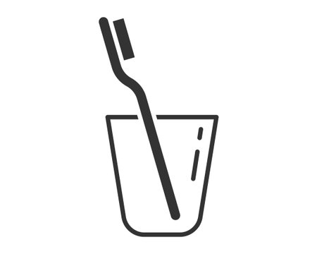 A simple, minimalist graphic of a toothbrush in a glass. It represents hygiene, oral care, and morning routine. Perfect for health and wellness websites, or dental related material.のイラスト素材