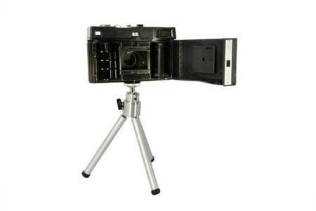 Old camera on a tripodの写真素材