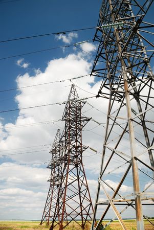 High voltage electric line at the fieldの写真素材