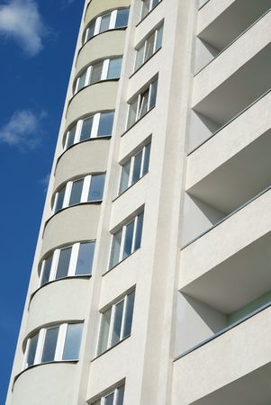 The facade of a modern apartment buildingの写真素材