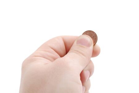 The hand holds euro cent on whiteの写真素材