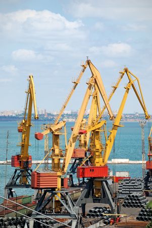 Port warehouse with containers and industrial cargoesの写真素材