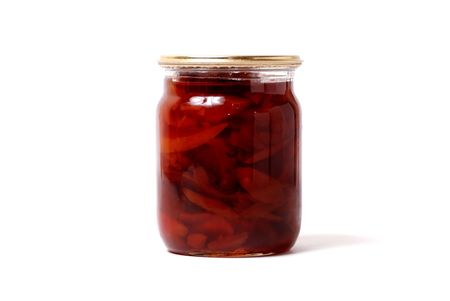 Preserve of quince jam in glass isolated on whiteの写真素材