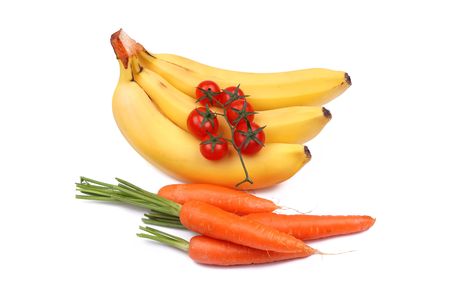 Bunch of bananas, tomatoes and carrot on whiteの写真素材