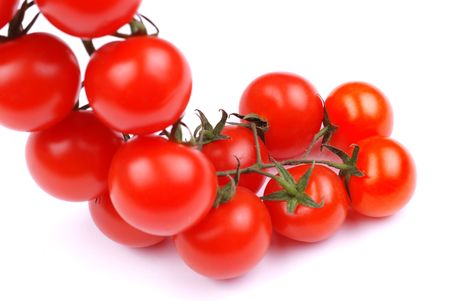 Cherry tomatoes isolated on white backgroundの写真素材