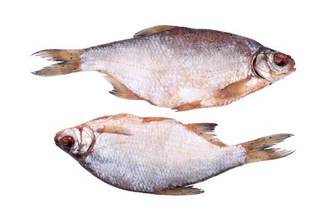 Two dried whole sea roach isolated on whiteの写真素材