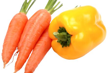 The carrots and pepper on a white backgroundの写真素材