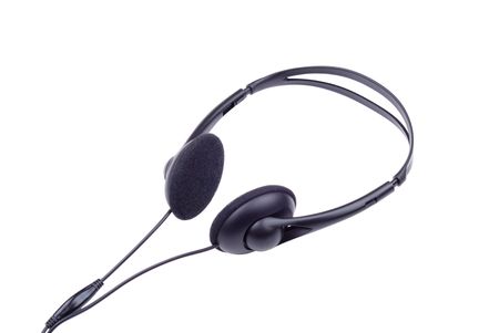 The black generic headphones isolated on whiteの写真素材
