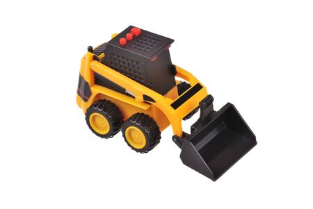 Small yellow toy tractor isloated on whiteの写真素材