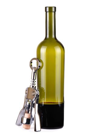One incomplete bottle of wine and corkscrew isolated on whiteの写真素材