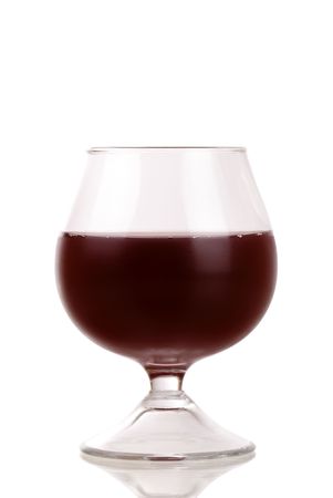 Red wine glass over a white backgroundの写真素材