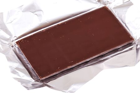 Open packing with chocolate isolated on whiteの写真素材
