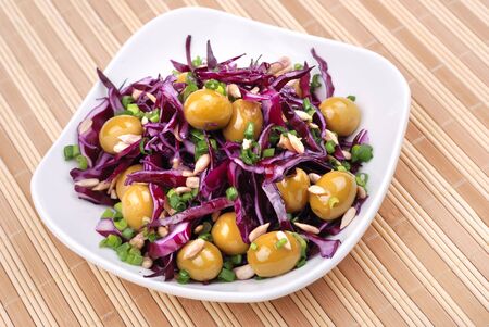 Salad from cabbage, olives and other vegetablesの写真素材