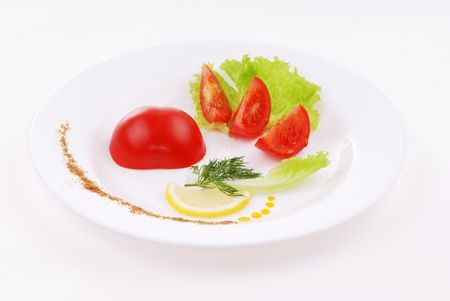 Concept of vegetable diet on a white plateの写真素材