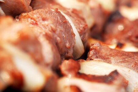 Barbeque background. Cooking meat on fireの写真素材