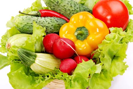 Vegetable harvest composition and greens on whiteの写真素材