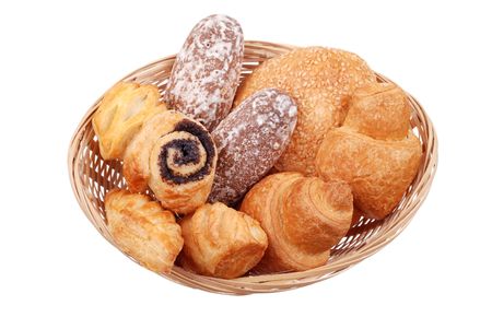 Fresh  buns in basket isolated on whiteの写真素材