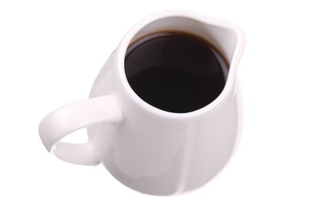 Dark sauce in white saucer isolatedの写真素材