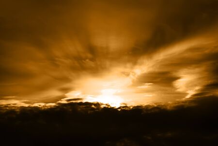 The beautiful red sunset in dark skyの写真素材