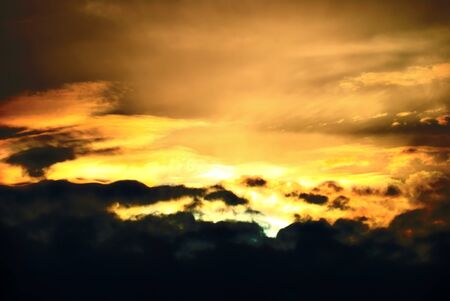 The beautiful red sunset in dark skyの写真素材