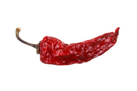 dry red hot chili pepper isolated on whiteの写真素材