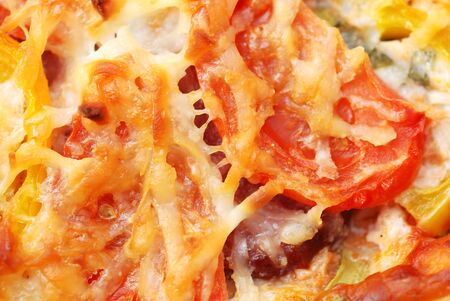 Background from a homemade pizza with tomatoの写真素材