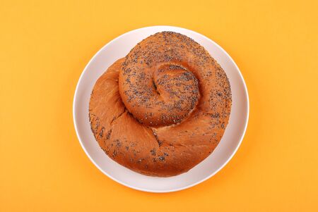 The fresh bun on yellow backgroundの写真素材