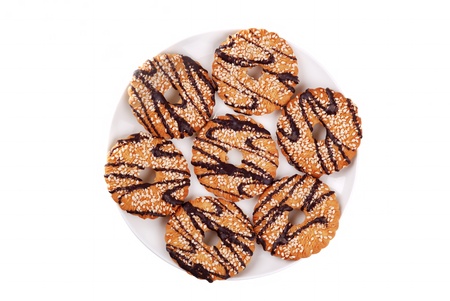 Cookies with chocolate glaze on a plateの写真素材