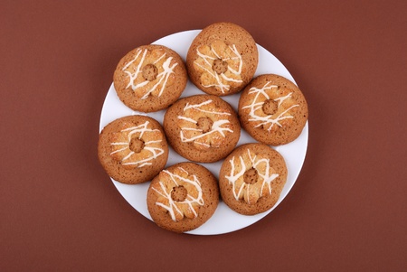 Cookies with white chocolate glaze on a plate