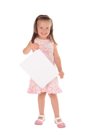 little girl holding a sheet of paper. studio shootの写真素材