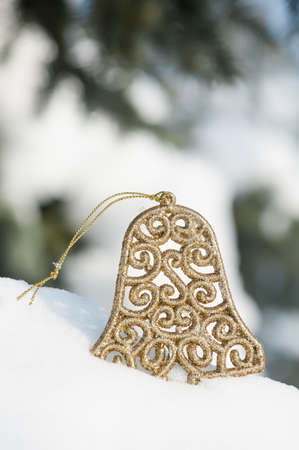 christmas bell in snow の写真素材