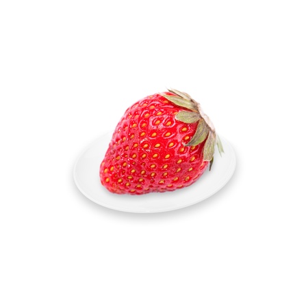 one strawberry on plateの写真素材