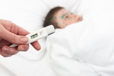 fever patient boy in bed